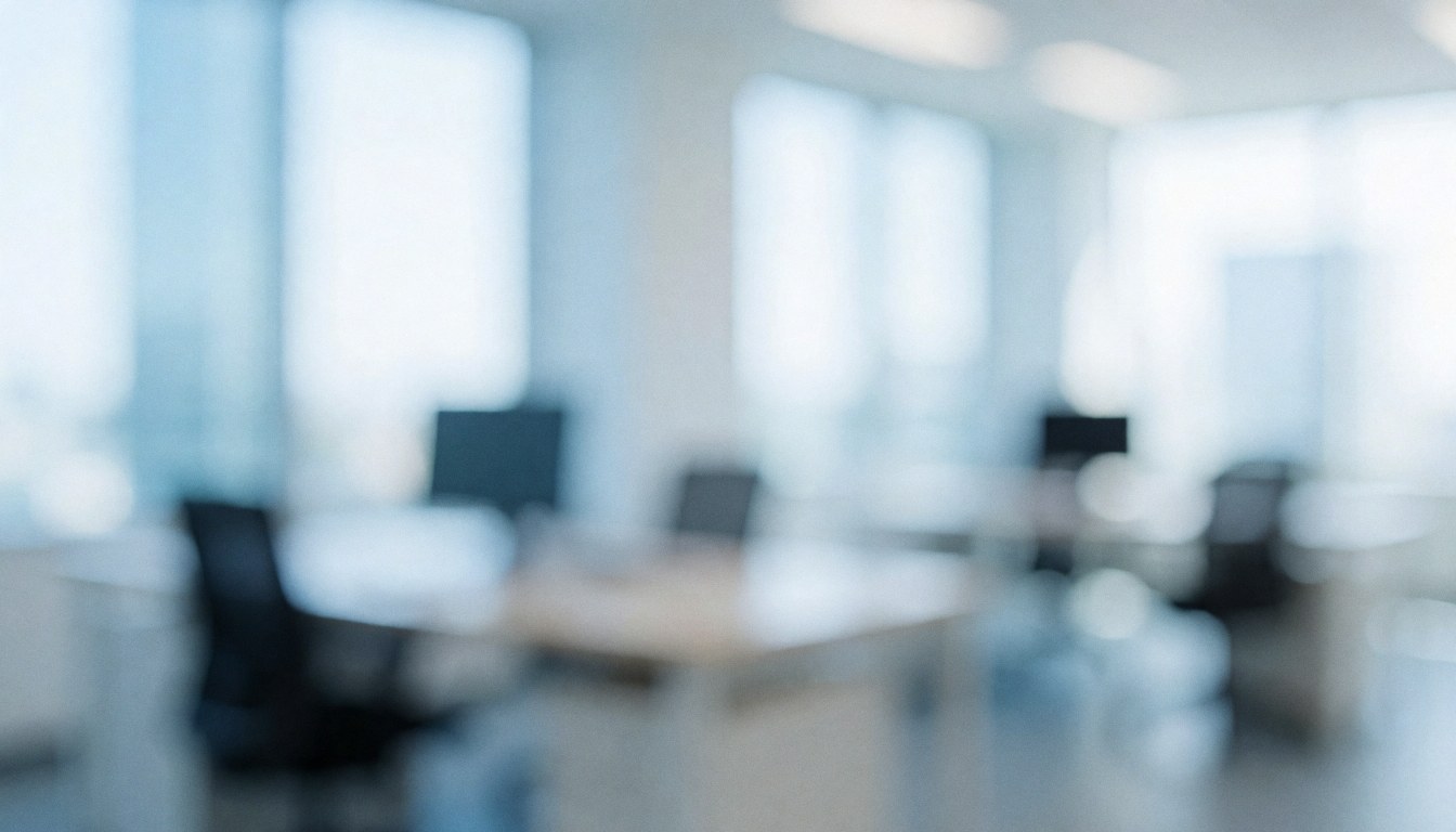 Fond d'espace de travail contemporain avec des nuances de bleu, créant une atmosphère professionnelle et apaisante pour vos contenus.